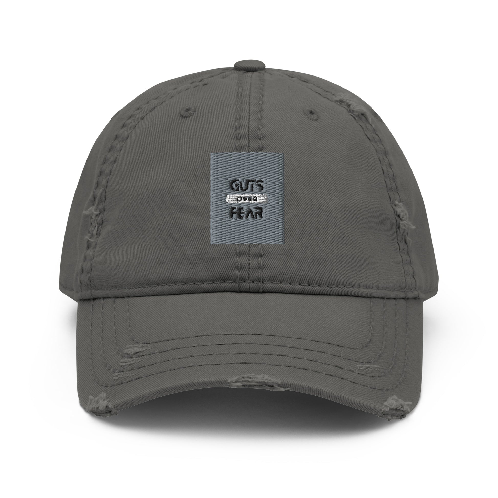 Image of a grey dad hat with the logo 'Guts Over Fear' embroidered in black thread on the front. The hat has a curved brim and an adjustable strap at the back for a comfortable fit."